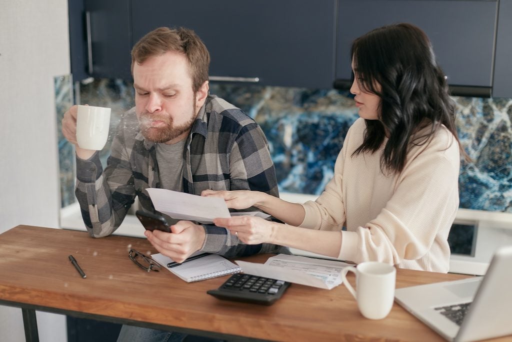 couple shocked by their car insurance bill