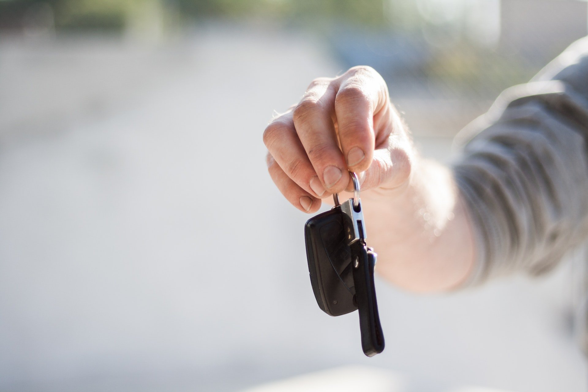 hand holding car keys