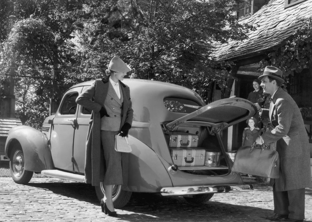 1940s auto packing the trunk