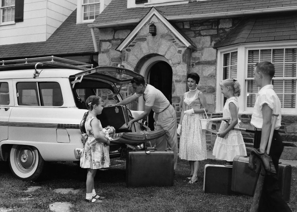 packing the car for a trip, American history of road trips