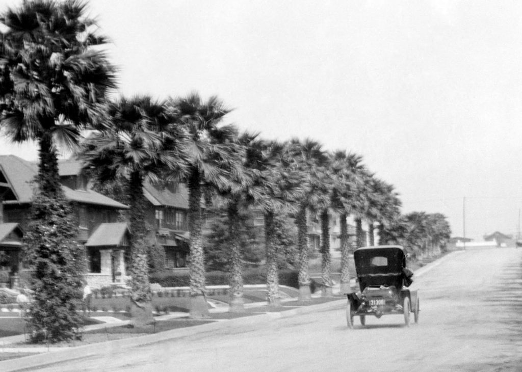 early 20th century american auto on road