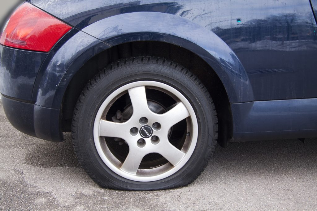 car with front flat tire