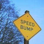 speed bump yellow sign