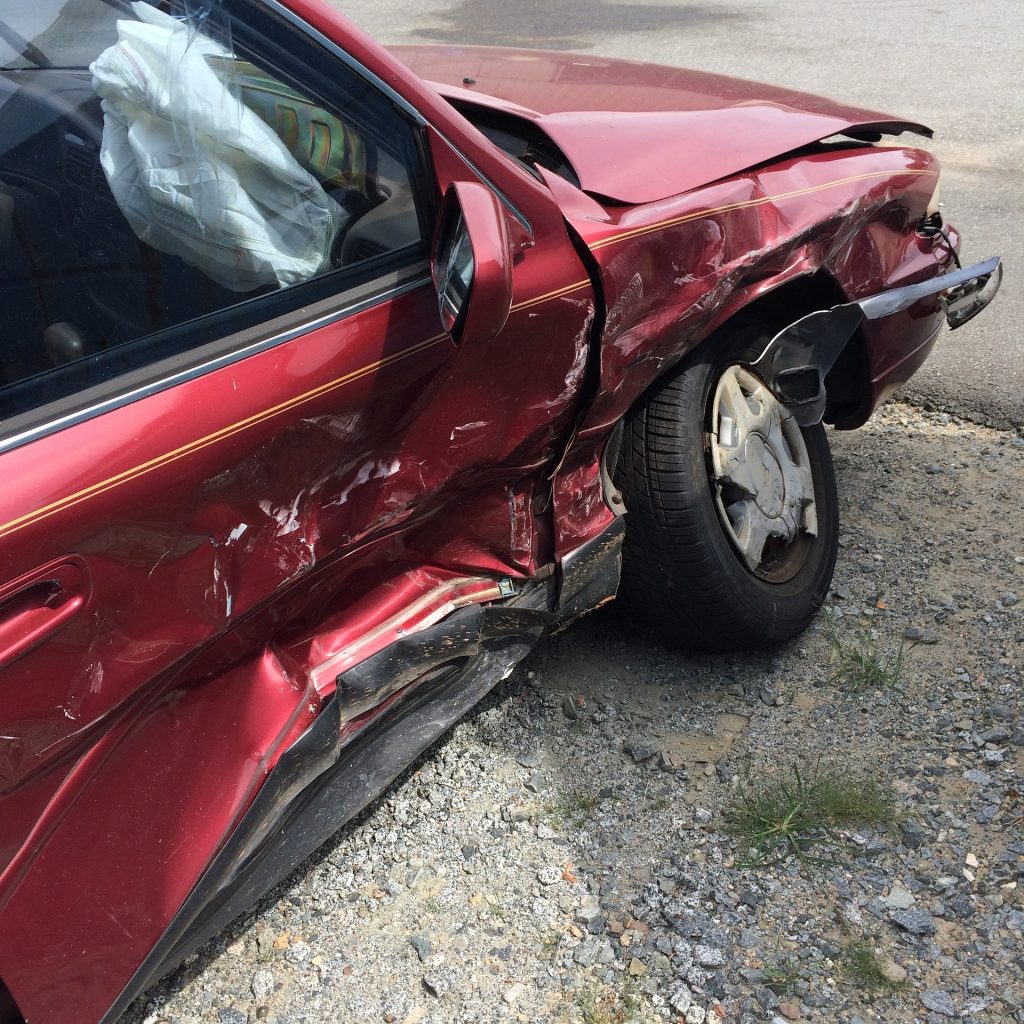 red car in accident
