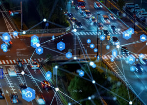 A bird's eye view of a city street grid with an AI-looking map overlay, symbolizing the use of telematics and data to create modern, personalized car insurance plans.